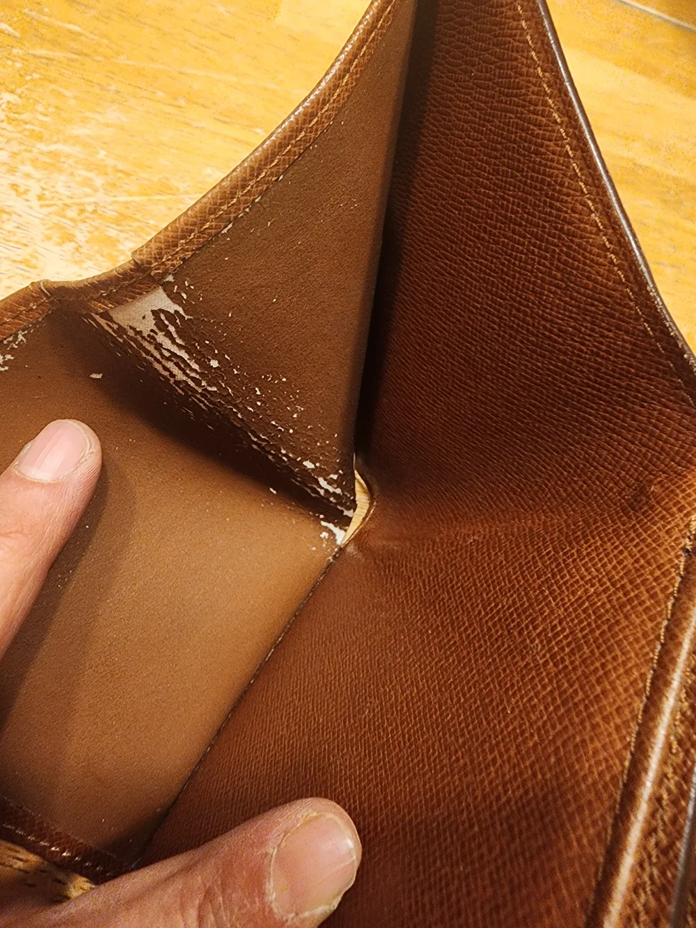 vintage Louis Vuitton Monogram Elise Wallet crafted in the classic brown LV